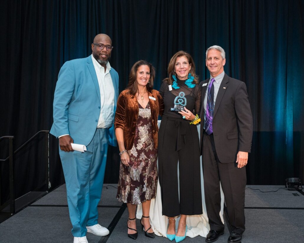 Barrett Brooks, Kelly L Green, Stephanie McAlaine, and Ron Siggs formally dressed at the 2024 Live It Up! gala supporting Help Hope Live.