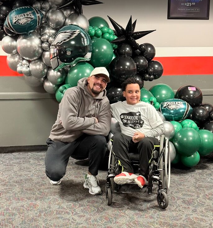 Zack Baun with 12-year-old Kelson Williams.