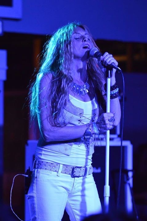 Noelle Doughty performing music as a singer pre-transplant.