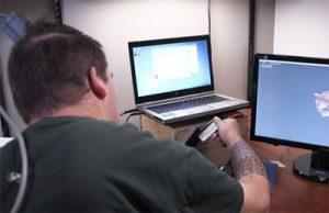 Ian Burkhart using a brain-computer interface (BCI)