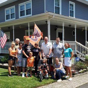 Group photo with Anastrasia Condon and Kelly L Green as she receives an adaptive bike