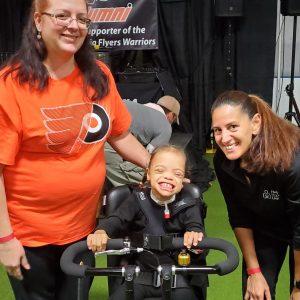 Rebekah Miller sitting on adaptive bike