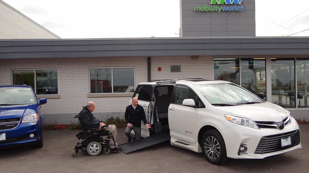 Man uses a wheelchair accessible van at MobilityWorks