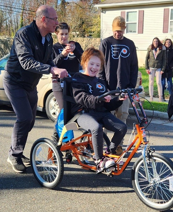 Raelynn Receives Our 20th Adaptive Bike Surprise