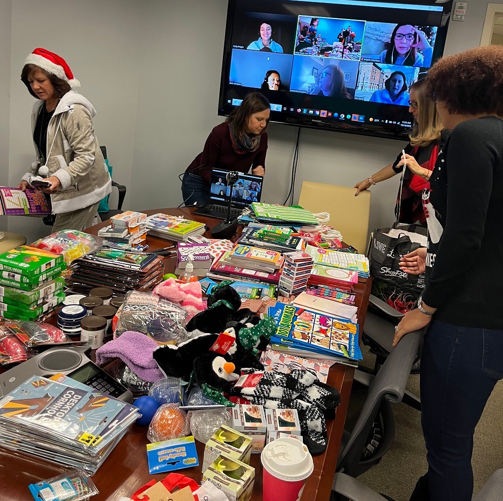 Help Hope Live staff packing Bags of Hope