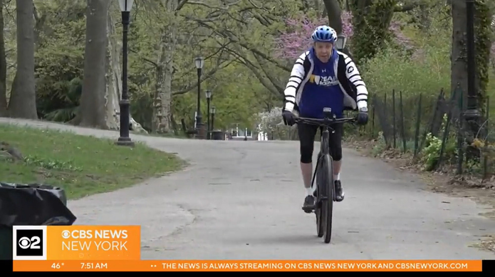 Jerry Cahill rides his bike through the park in a CBS New York news clip.