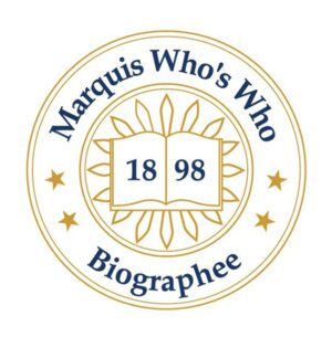 A professional seal reads Marquis Who's who Biographee 1898 with a graphic of a gold book, stars, and sunbursts.