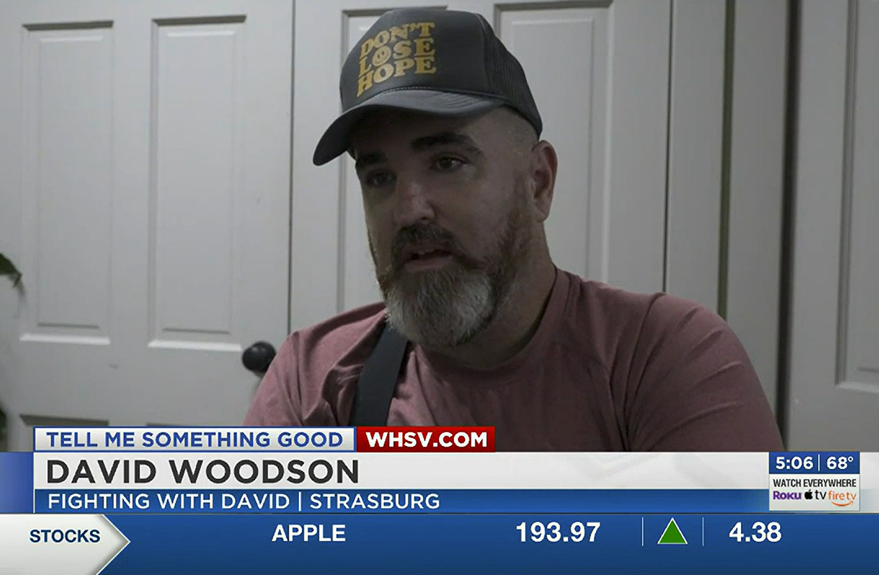 David Woodson is a 36-year-old man seated in his wheelchair with light skin, a salt-and-pepper beard, and a ball cap that says Don't Lose Hope in this TV news coverage from WHSV.