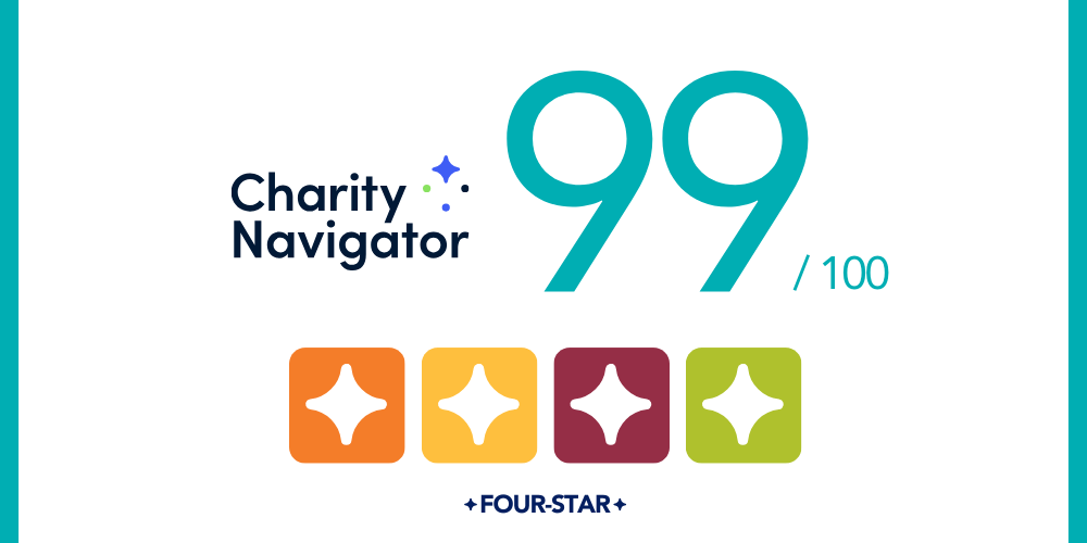 A graphic reads Charity Navigator: 99/100 FOUR-STAR with four stars in different colors: orange, yellow, maroon, and light green.