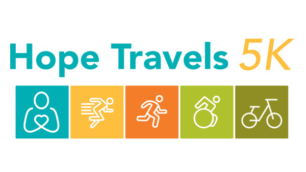 A logo reads Hope Travels 5K with logos of the Help Hope Live pledge figure, a runner, a jogger, a wheelchair user, and a bicycle.