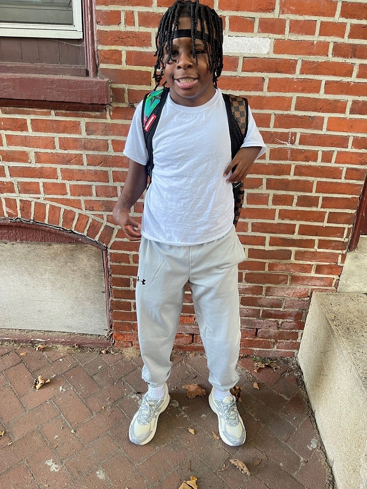 Blake Turner, a preteen with dark skin.