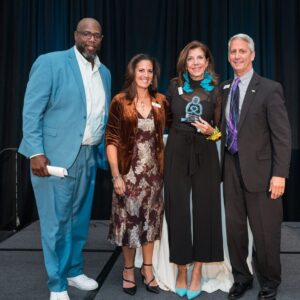 Barrett Brooks, Kelly L Green, Stephanie McAlaine, and Ron Siggs formally dressed at the 2024 Live It Up! gala supporting Help Hope Live.