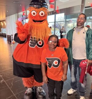 Raymeer Bacon-El meets Flyers Gritty in October 2025.