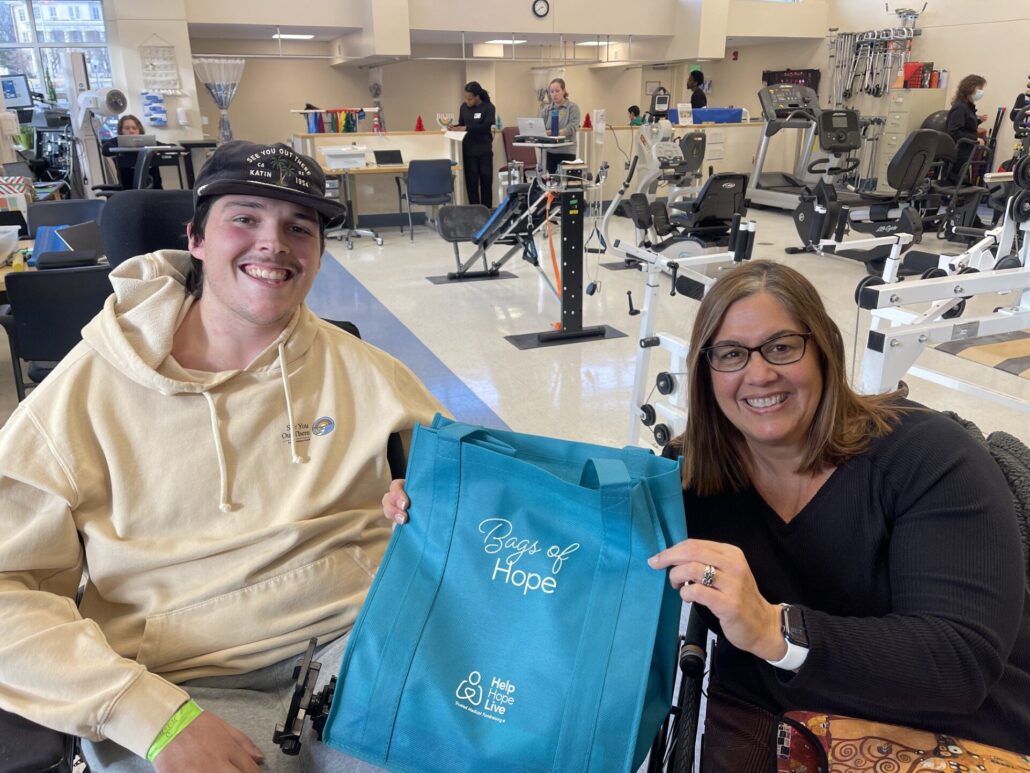 Director of Newly Injured Rose Dougherty delivers Bags of Hope to the National Rehabilitation Hospital, pictured with Hunter, C5 complete quadriplegic from Maryland. 