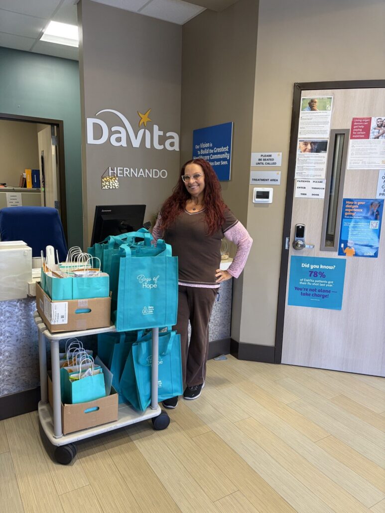 Melissa Tuff delivers Bags of Hope for the 2025 holiday season to Davita Hernando.