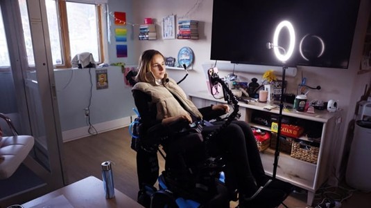 Rebecca Koltun filming a social meda video with a ringlight via Newsday December 2025.