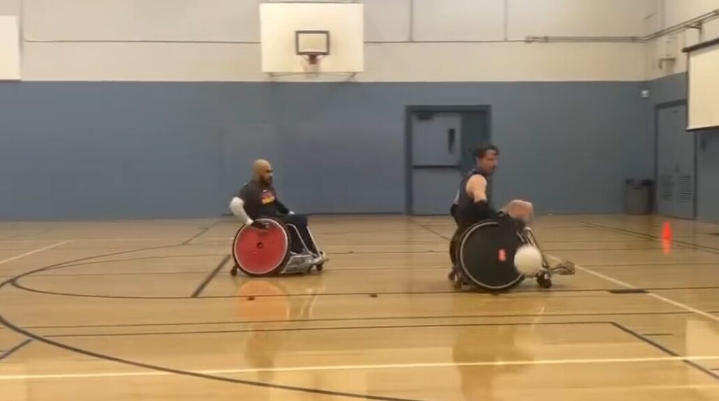 Screenshot of video of Arthur Martinot playing wheelchair rugby at Rugby Rave 2026.