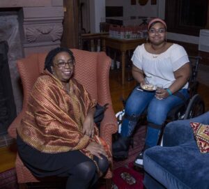 Keather Littlejohn seated in her wheelchair with Melanie Johnson from Help Hope Live.