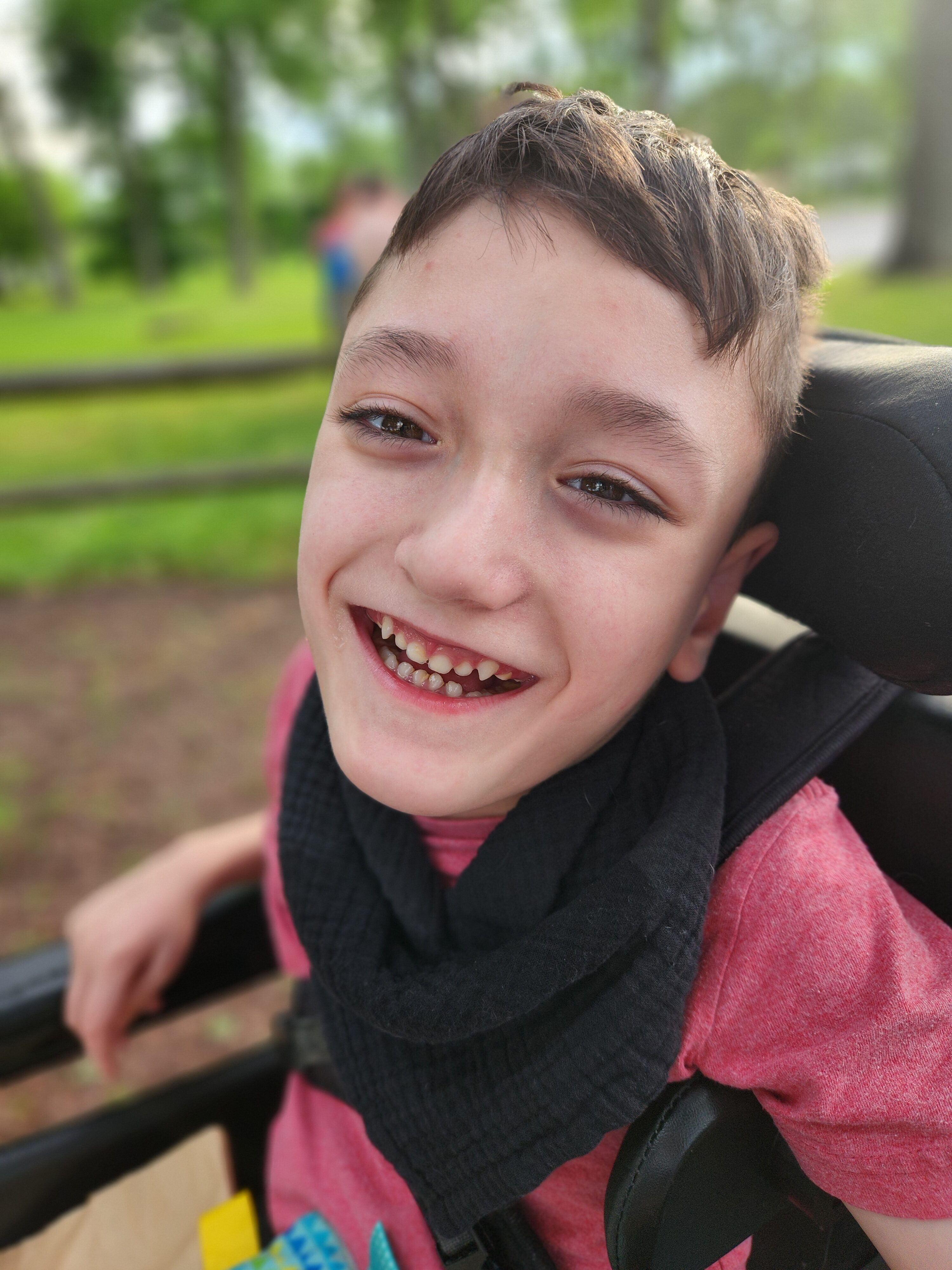 Benjamin Yeatts seated in his wheelchair.