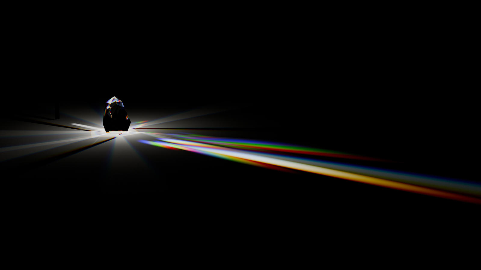 Forma sfaccettata che proietta un ampio spettro arcobaleno sul nero