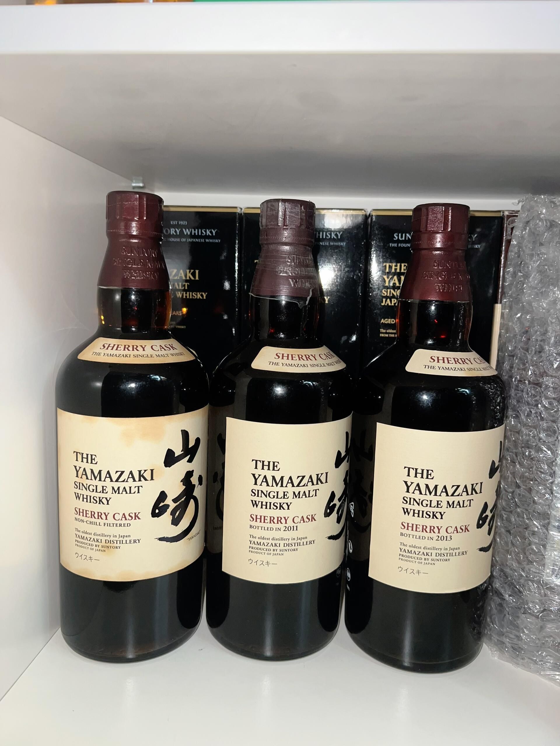 完整包裝與無盒舊酒收購價差異示意