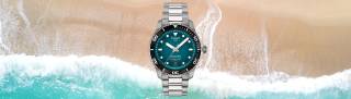 Tissot Seastar med automatverk med strand och hav i bakgrunden