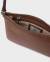 En bild på Saddler Axelremsväska Frances - Brun, Frances - sophisticated shoulder bag from Saddler som du kan beställa online hos klockia.se till snabb leverans och bra pris.