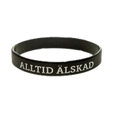 Armband - Silikon - Alltid älskad - Svart, en produkt från Nya Musik som utvecklar och engagerar människor i alla åldrar.