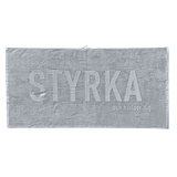 Badhandduk – Styrka -Grå, en produkt från Nya Musik som utvecklar och engagerar människor i alla åldrar.