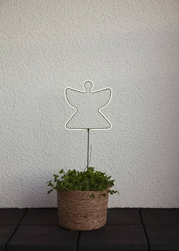 Siluett Neonängel, en produkt från Nya Musik som utvecklar och engagerar människor i alla åldrar.