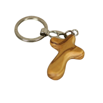 Nyckelring - Kors - Olivträ, en produkt från Nya Musik som utvecklar och engagerar människor i alla åldrar.