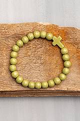 Armband kula, kors – Ljusgrön, en produkt från Nya Musik som utvecklar och engagerar människor i alla åldrar.