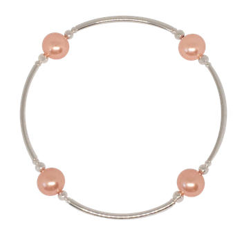 Välsignelsearmband - Pärlor - Persika - 8 mm, en produkt från Nya Musik som utvecklar och engagerar människor i alla åldrar.