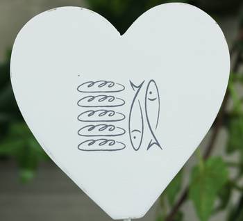 Hushållspappershållare - Fem bröd och två fiskar, en produkt från Nya Musik som utvecklar och engagerar människor i alla åldrar.