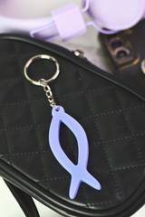 Nyckelring i mjuk silikon - Jesusfisken, en produkt från Nya Musik som utvecklar och engagerar människor i alla åldrar.