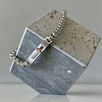 Armband – Kors, en produkt från Nya Musik som utvecklar och engagerar människor i alla åldrar.