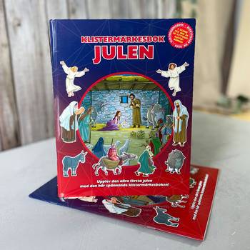 Klistermärkesbok Julen, en produkt från Nya Musik som utvecklar och engagerar människor i alla åldrar.
