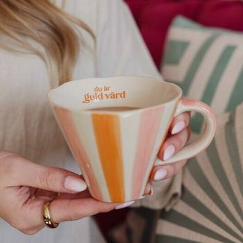 Mugg - Du är guld värd, en produkt från Nya Musik som utvecklar och engagerar människor i alla åldrar.