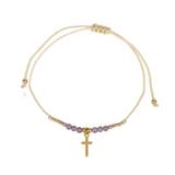 Armband - Pärlor och kors - Lila, en produkt från Nya Musik som utvecklar och engagerar människor i alla åldrar.