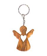 Nyckelring - Ängel med hjärta - Olivträ, en produkt från Nya Musik som utvecklar och engagerar människor i alla åldrar.