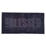 Badhandduk – I am blessed - Svart, en produkt från Nya Musik som utvecklar och engagerar människor i alla åldrar.