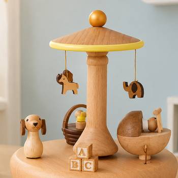Speldosa - Karusell med baby, en produkt från Nya Musik som utvecklar och engagerar människor i alla åldrar.