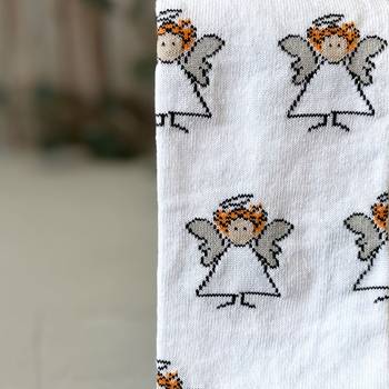 Strumpor – Änglar, vit, storlek 35-38, en produkt från Nya Musik som utvecklar och engagerar människor i alla åldrar.