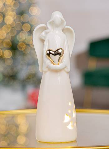 Ängel i keramik med LED-belysning, en produkt från Nya Musik som utvecklar och engagerar människor i alla åldrar.