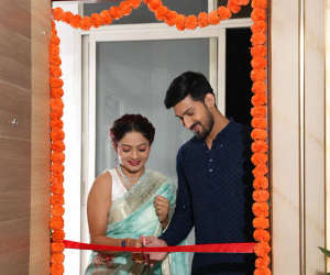 Couple walking into their new home after possession
