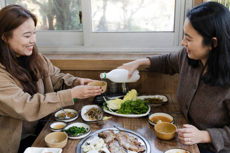 In Korea, it is customary to use both hands when pouring or receiving a drink.