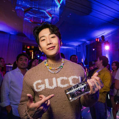 Jay Park holding a bottle of Wonsoju