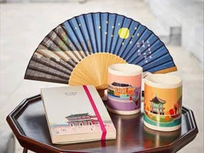 Books, fans, and cups from the National Palace Museum of Korea Gift Shop.