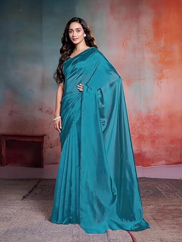 Garden Vareli Teal Solid Organza Saree