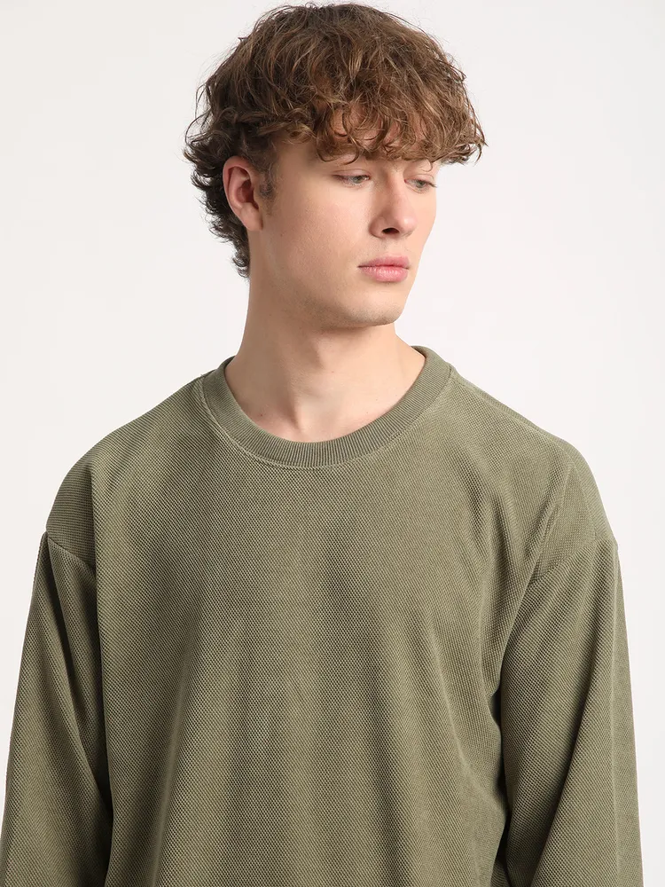 Men Green Solid Relaxed Fit Sweatshirt